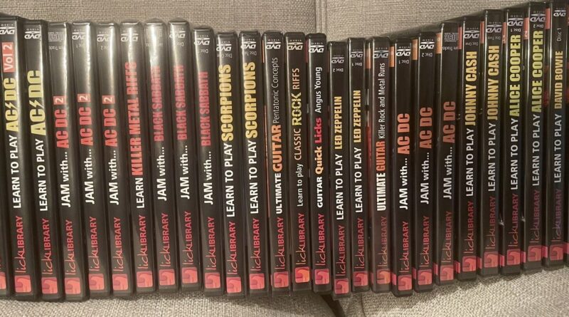 Lick Library-27 DVDS and Jam Tracks.  Many Unopened- Rock Guitar Instruction