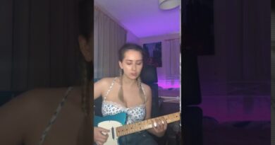 Mimi plays walking bass on guitar
